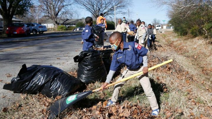 Boy Scout Troop 1921 cleaning up the side of the road