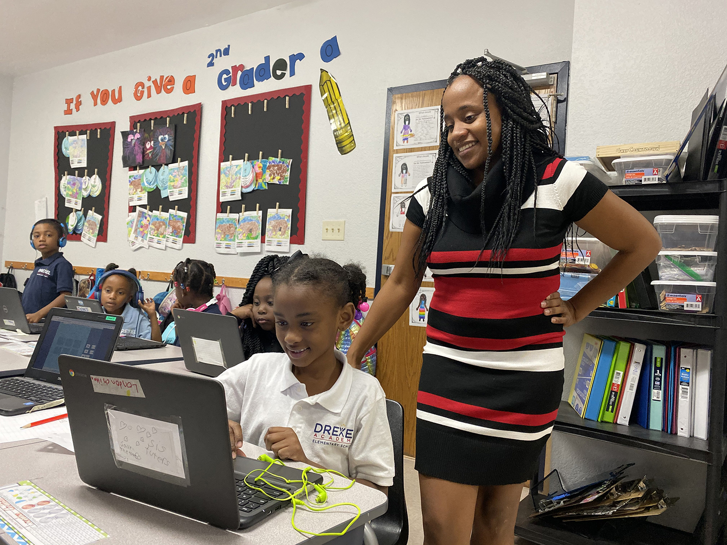 drexel academy - mission - image students learning on chromebooks