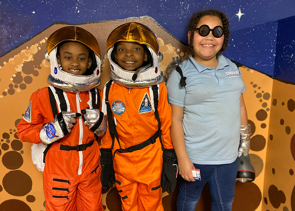 S.O.L.E. students in NASA space suits