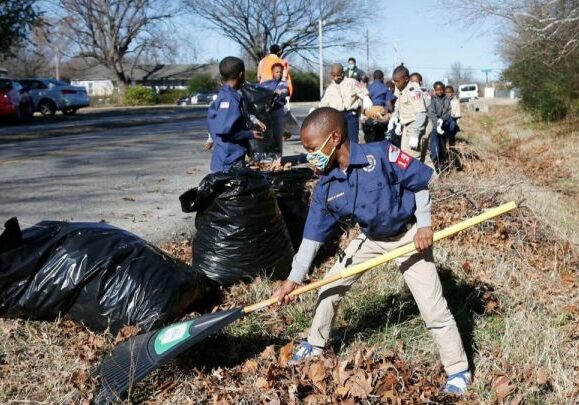 Boy Scout Troop 1921 cleaning up the side of the road